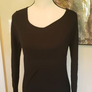 Black sweater dress with exposed zipper on back